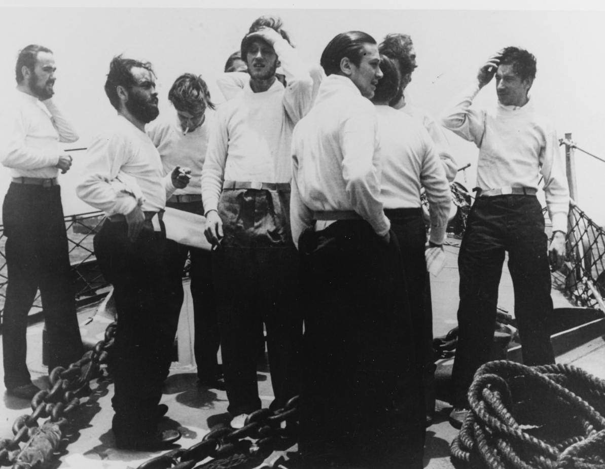 Some of the German prisoners watch from Chatelain’s fo’c’sle as Guadalcanal prepares to take their former submarine in tow, 4 June 1944. The men wear U.S. survivor issue uniforms in place of their own clothing, which was soaked from when they abandoned ship. (U.S. Navy Photograph 80-G-49178, National Archives and Records Administration, Still Pictures Division, College Park, Md.)