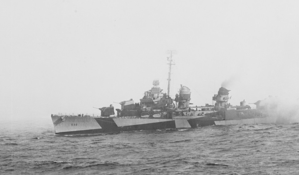 Heermann, as seen from the escort carrier Kalinin Bay (CVE-68), attempting to lay down a smoke screen during the engagement off Samar on 25 October 1944. (U.S. Navy Photograph 80-G-270517, National Archives and Records Administration, Still Pictures Division, College Park, Md.)