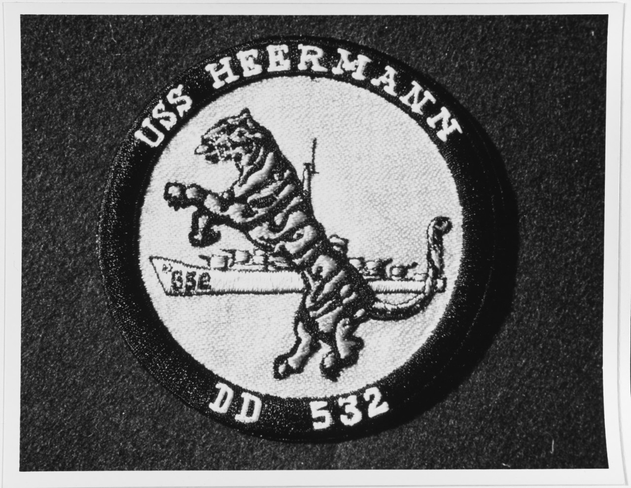 Heermann emblem in use circa 1957. (Naval History and Heritage Command Photograph NH 78949-KN)