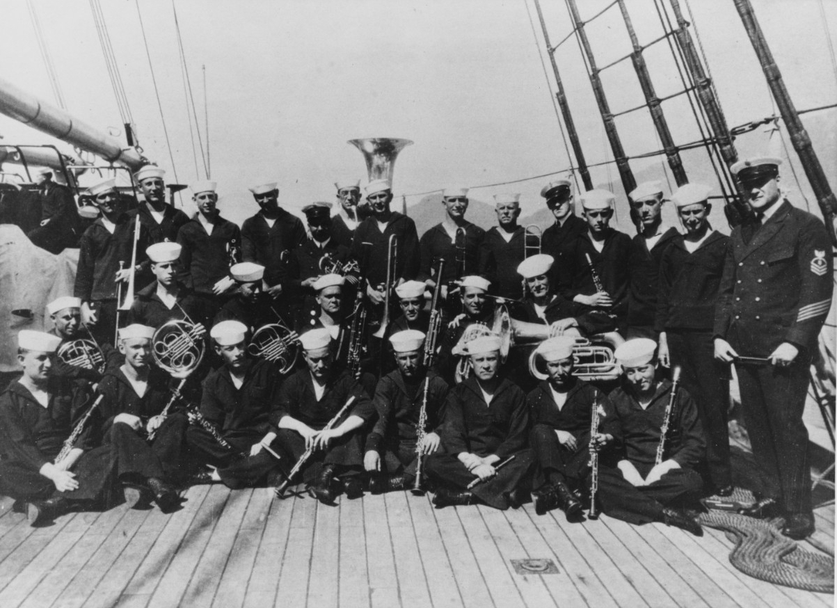 The Washington Navy Yard Band on board Henderson. The band accompanied President Warren G. Harding to Alaska in 1923. Chief Petty Officer Charles Benter, the group's leader, is on the right. (Naval History and Heritage Command Photograph NH 76082)