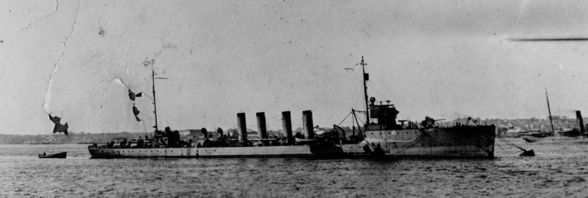 Jouett, circa 1918, moored to a buoy, one of her boats riding to a line astern, the ship painted in a solid color scheme, with her identification number (41) painted on the hull in white. (Naval History and Heritage Command Photograph NH 80742) 