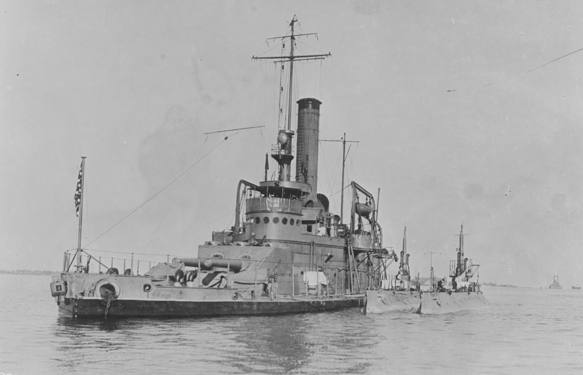Tallahassee (Monitor No. 9) anchored in Hampton Roads, Va., 10 December 1916, tending K-6 (Submarine No. 37) and K-5 alongside. (Naval History and Heritage Command Photograph NH 61251)