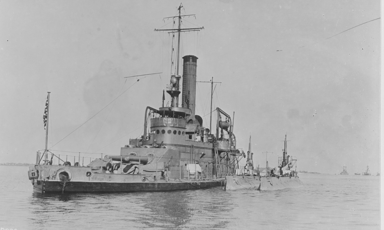 Tallahassee (Monitor No. 9) anchored in Hampton Roads, Va., 10 December 1916, tending K-6 (Submarine No. 37) and K-5. (Naval History and Heritage Command Photograph NH 61251)
