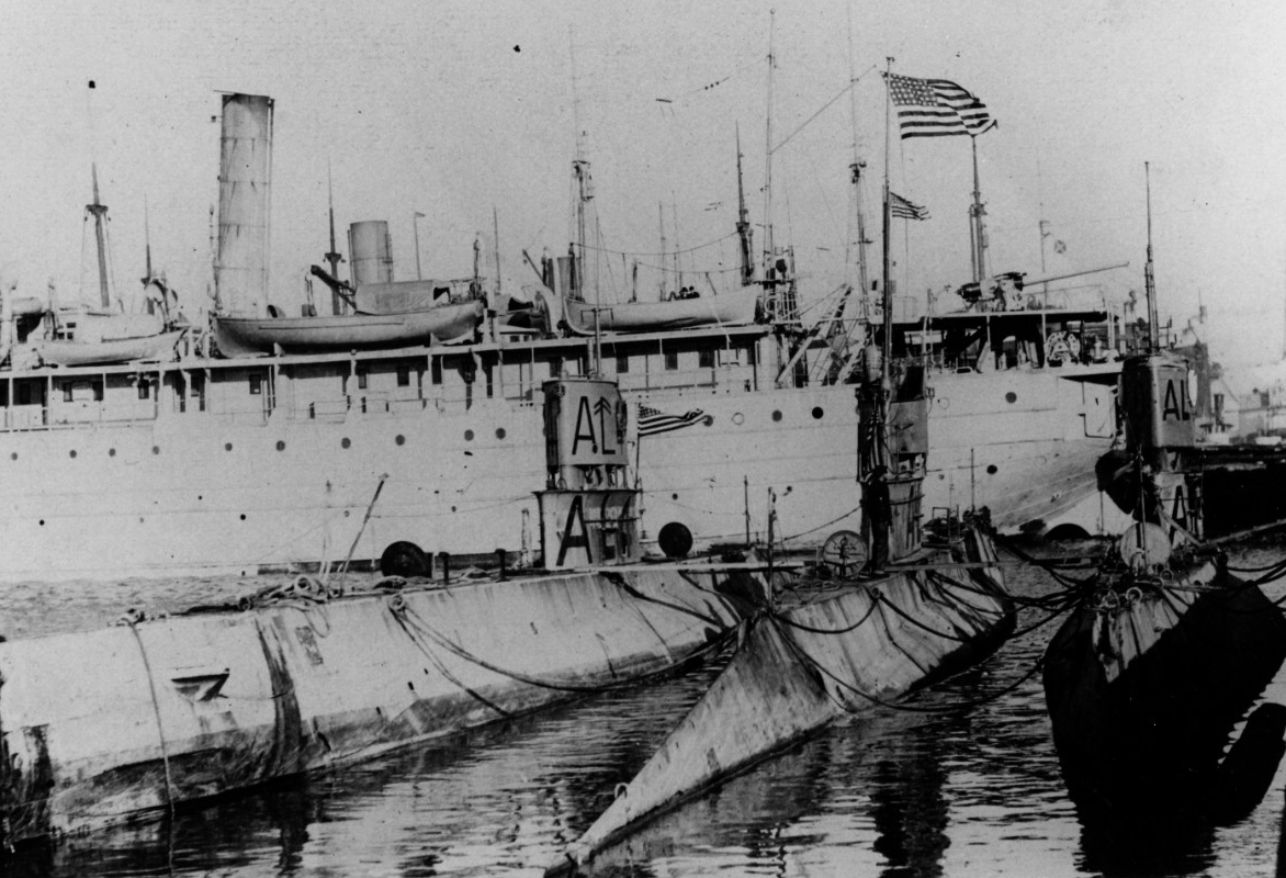 L-4, L-1, and L-10 (listed from left to right) at the Philadelphia Navy Yard, soon after their 1 February 1919 return to the U.S. from European waters. Ship in the immediate background is either Quinnebaug (Id. No.1687) or Saranac (Id. No. 1702),...