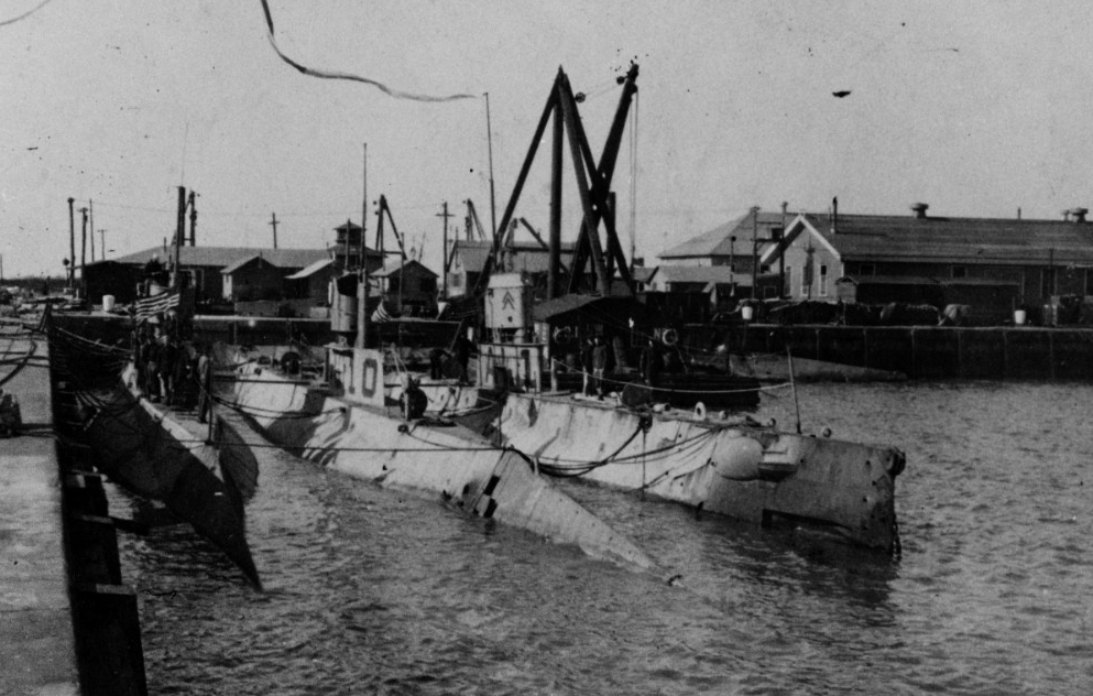 From left to right, L-4, L-10, and L-1 (listed from left to right) at the Philadelphia Navy Yard, soon after their 1 February 1919 return to the U.S. from European waters. Note what appears to be a very long homeward bound pennant flying from the...
