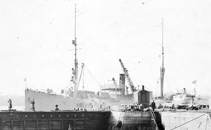 Leonidas at the Portsmouth Navy Yard in 1917 after the recent gun installation on her forecastle. Also note the sentry at left, mobile crane in the center, and steam launch on a cradle at right. (Naval History and Heritage Command Photograph NH 5...