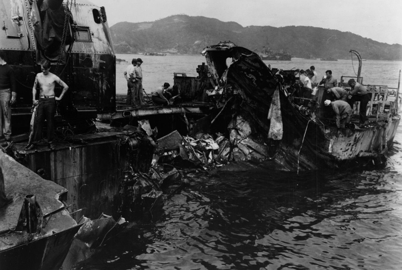 Leutze at Kerama Retto, showing significant damage to the ship’s port side aft sustained in a kamikaze attack, 9 April 1945. (Naval History and Heritage Command Photograph NH 69110)