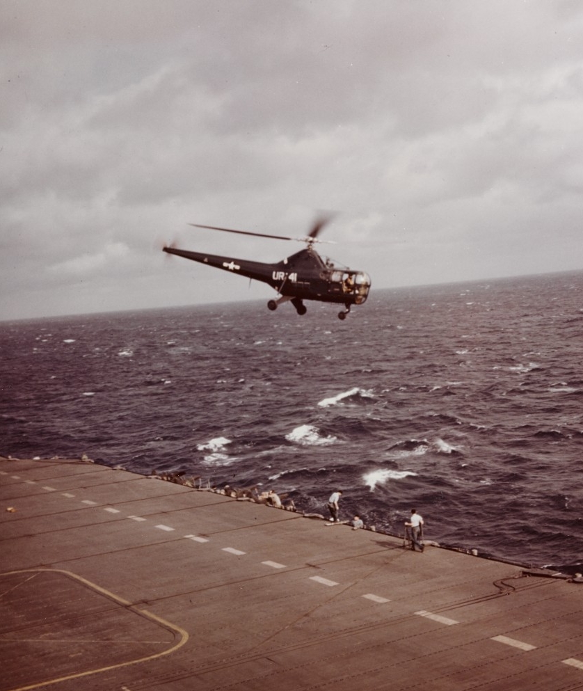 A Sikorsky HO3S-1 flies beside Leyte during the Second Task Fleet's Operation Frigid, November 1948. (U.S. Navy Photograph 80-G-K-9496, National Archives and Records Administration, Still Pictures Division, College Park, Md.)