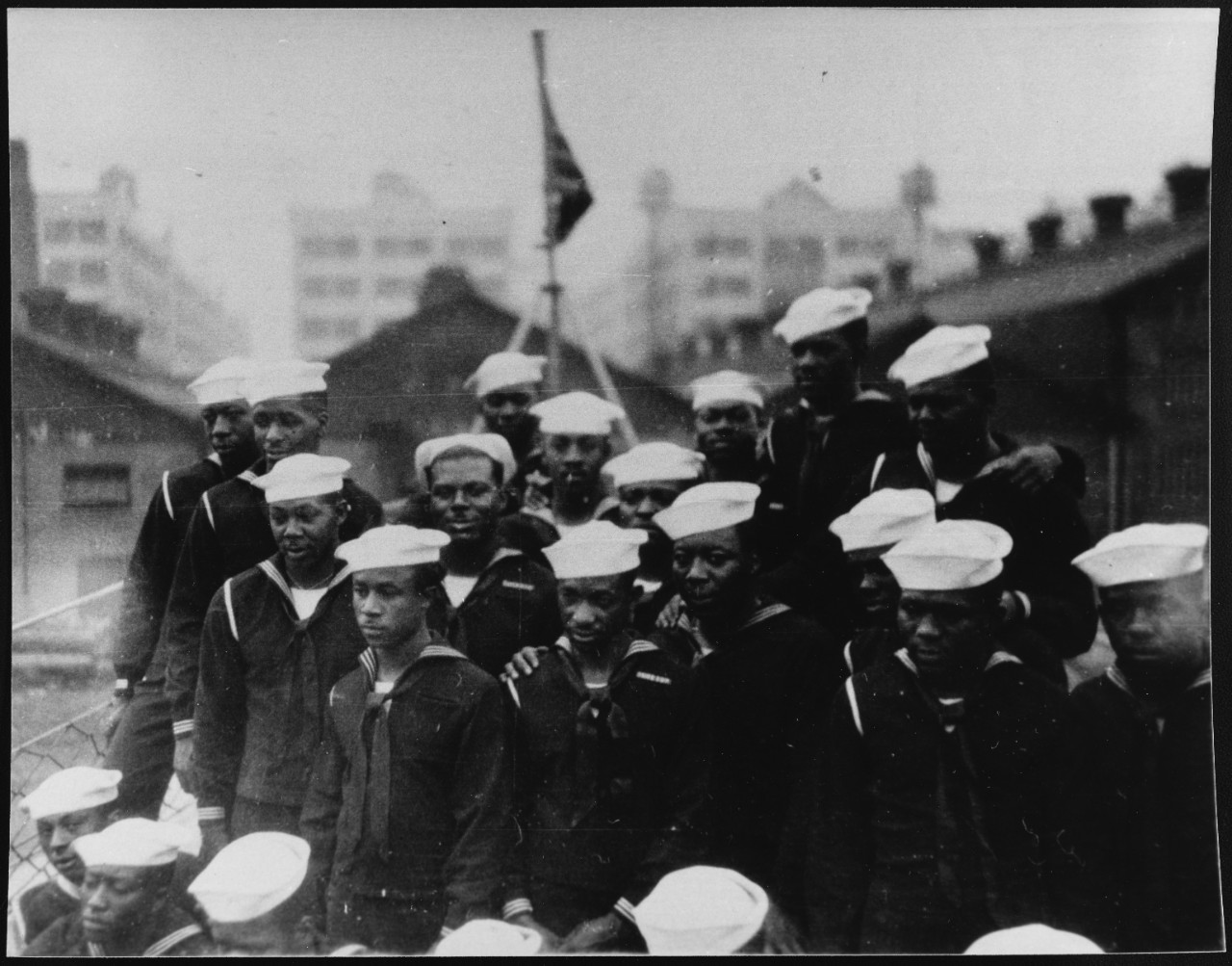 Mason’s crew mustered in their Dress Blues on the ship's bow while moored at New York Harbor, New York. (Naval History and Heritage Command Photograph NH 106729)