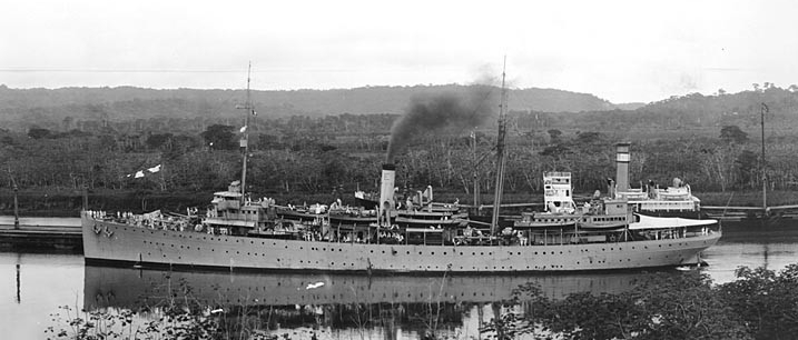 Melville approaches the Gatun Locks while passing through the Panama Canal, 11 June 1927. Immediately beyond Melville is Edwin Christenson, an American freighter built in 1918 as West Wind. (Naval History and Heritage Command Photograph NH 105061-A)
