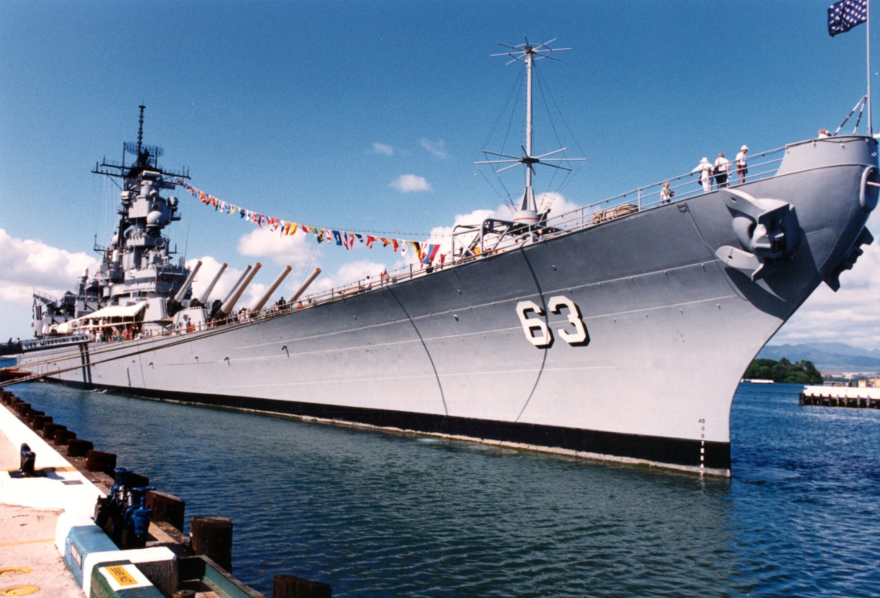 The battleship USS Missouri (BB-63) stands moored to a pier at Naval Station Pearl Harbor, Hawaii. Missouri is in Hawaii to take part in the observance of the 50th anniversary of the Japanese attack on Pearl Harbor.