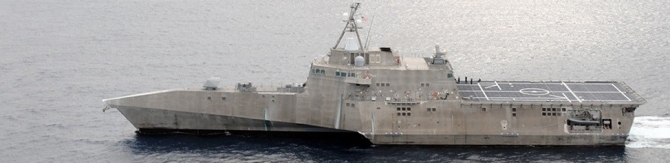 A photograph of Independence (LCS-2) at sea represents the class and emphasizes the stealth design of her hull, intended to reduce her profile and radar signature in combination with the ship’s sensors and systems. (Unattributed or dated U.S. Navy photograph, Navy NewsStand).