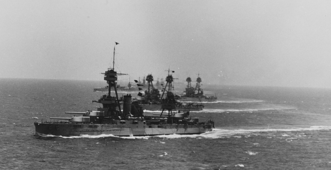 Eight battleships at sea during winter maneuvers of the joint U.S. fleets, circa 1930. New York is in the foreground. (Naval History and Heritage Command, NH 73835)