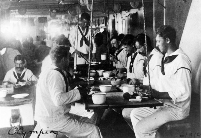 Sailors of the ships company eat at their mess, c. 1898. (Unattributed or dated U.S. Navy Photograph NH 60779, Photographic Section, Naval History and Heritage Command)
