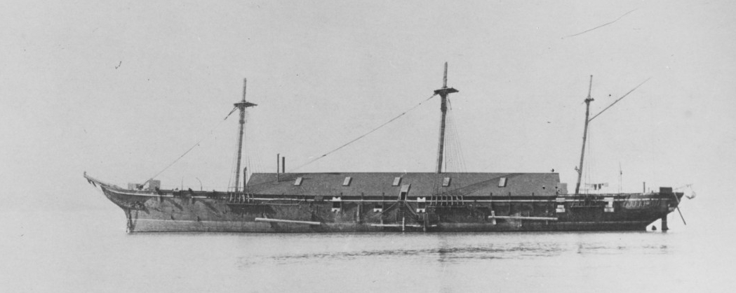 A port broadside view of Omaha while she serves as a quarantine ship with the Marine Hospital Service in San Francisco Bay shows her hull all but covered by a wooden superstructure, circa 1890s. (Naval History and Heritage Command Photograph NH 7...