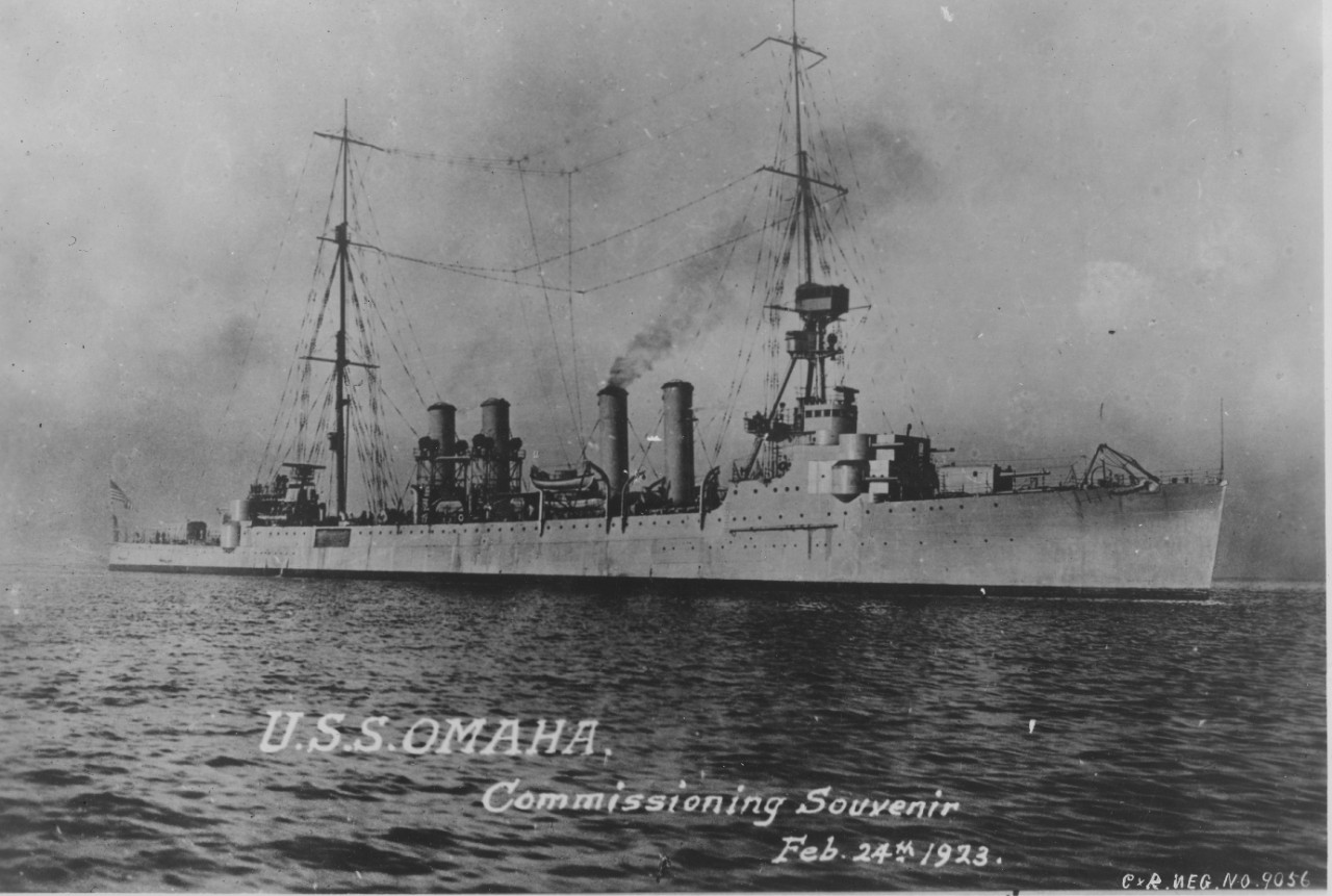 An image of Omaha (CL–4) issued as a souvenir of her commissioning. Note that at this time she had not received her catapults, and her lower bank of torpedoes appears to be behind canvas. (U.S. Navy Bureau of Ships Photograph 19-N-9056, National ...