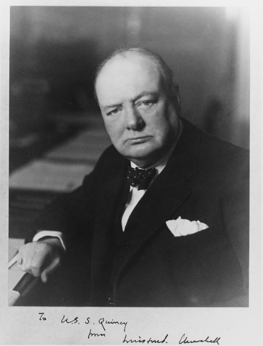 Churchill inscribes this portrait to the ship during his visit to Roosevelt at Alexandria, 15 February 1945. (Naval History and Heritage Command Photograph NH 82513)