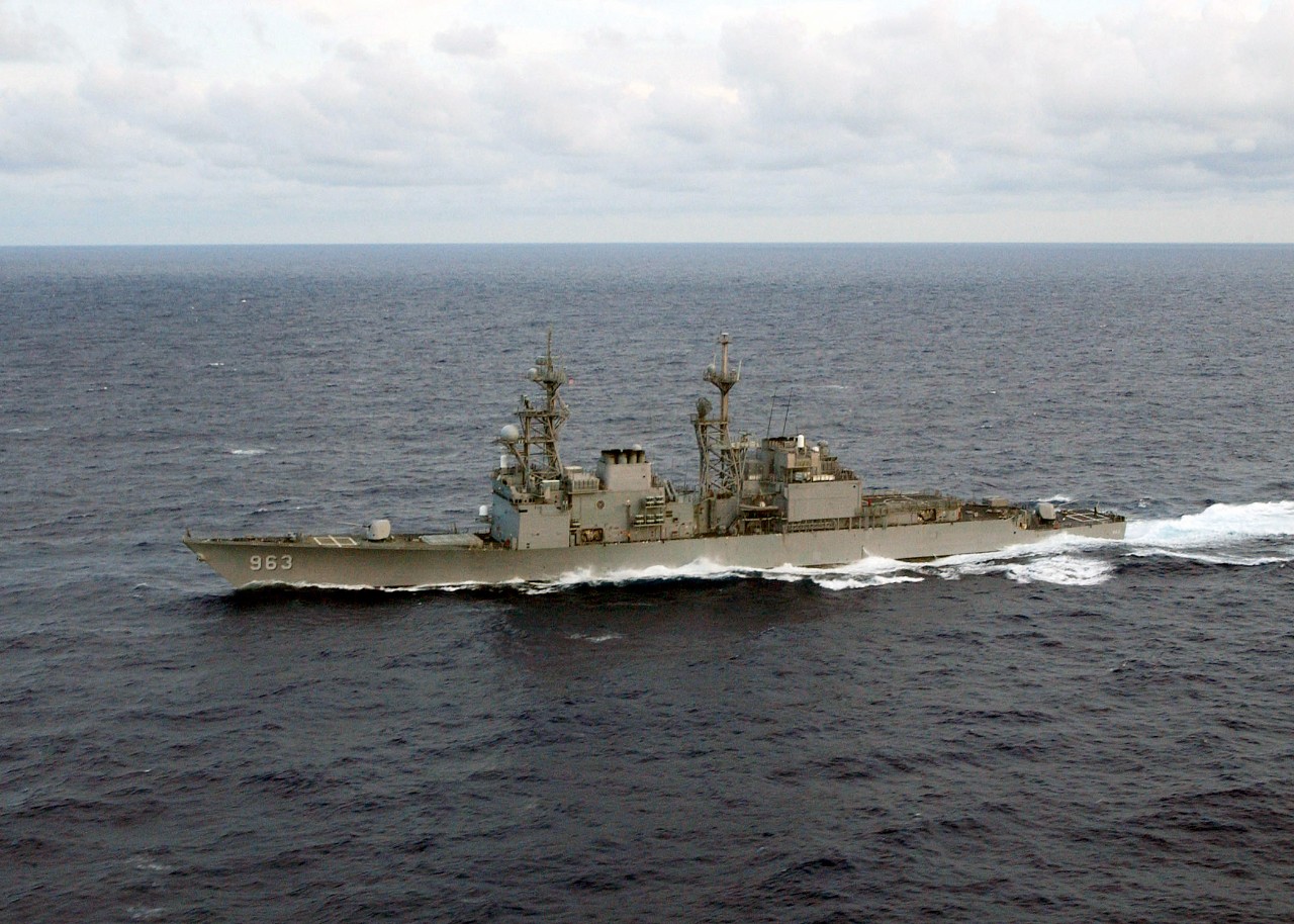 Spruance presents a familiar but somewhat altered silhouette from her many upgrades as the weathered warship steams into JtfEx 04-02, 11 June 2004. (U.S. Navy Photograph DN-SD-05-03004, Records of the Office of the Secretary of Defense, 1921–2008...