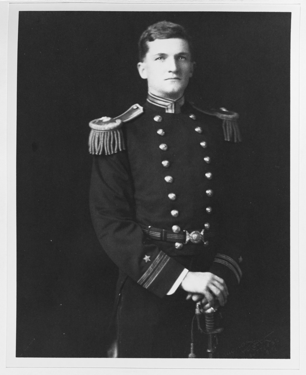 A portrait photograph captures a youthful Stark, probably taken when his ship, Minnesota, visits San Francisco, Calif., in 1908, during the Great White Fleet’s World cruise. Photographed by Vaughan & Keith of San Francisco. (Collection of Adm. Harold R. Stark. U.S. Navy Photograph NH 93275, Photographic Section, Naval History and Heritage Command).
