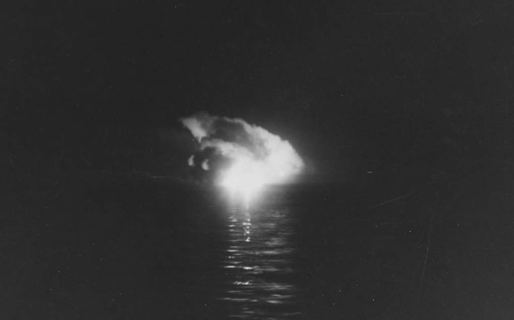 Japanese warship burning during the Battle of Kula Gulf, 5-6 July 1943, as seen from on board Nicholas. (U.S. Navy Photograph 80-G-52851, National Archives and Records Administration, Still Pictures Division, College Park, Md.)