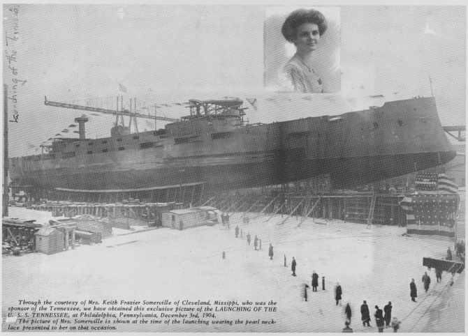 A fine screen halftone reproduction of a photograph of the ship ready for launching at the Cramp Shipyard, 3 December 1904. A portrait of her sponsor, Miss Annie K. Frazier, is vignetted into the view. (U.S. Navy Photograph NH 99945, Collection of The Society of Sponsors of the United States Navy, Photographic Section, Naval History and Heritage Command)