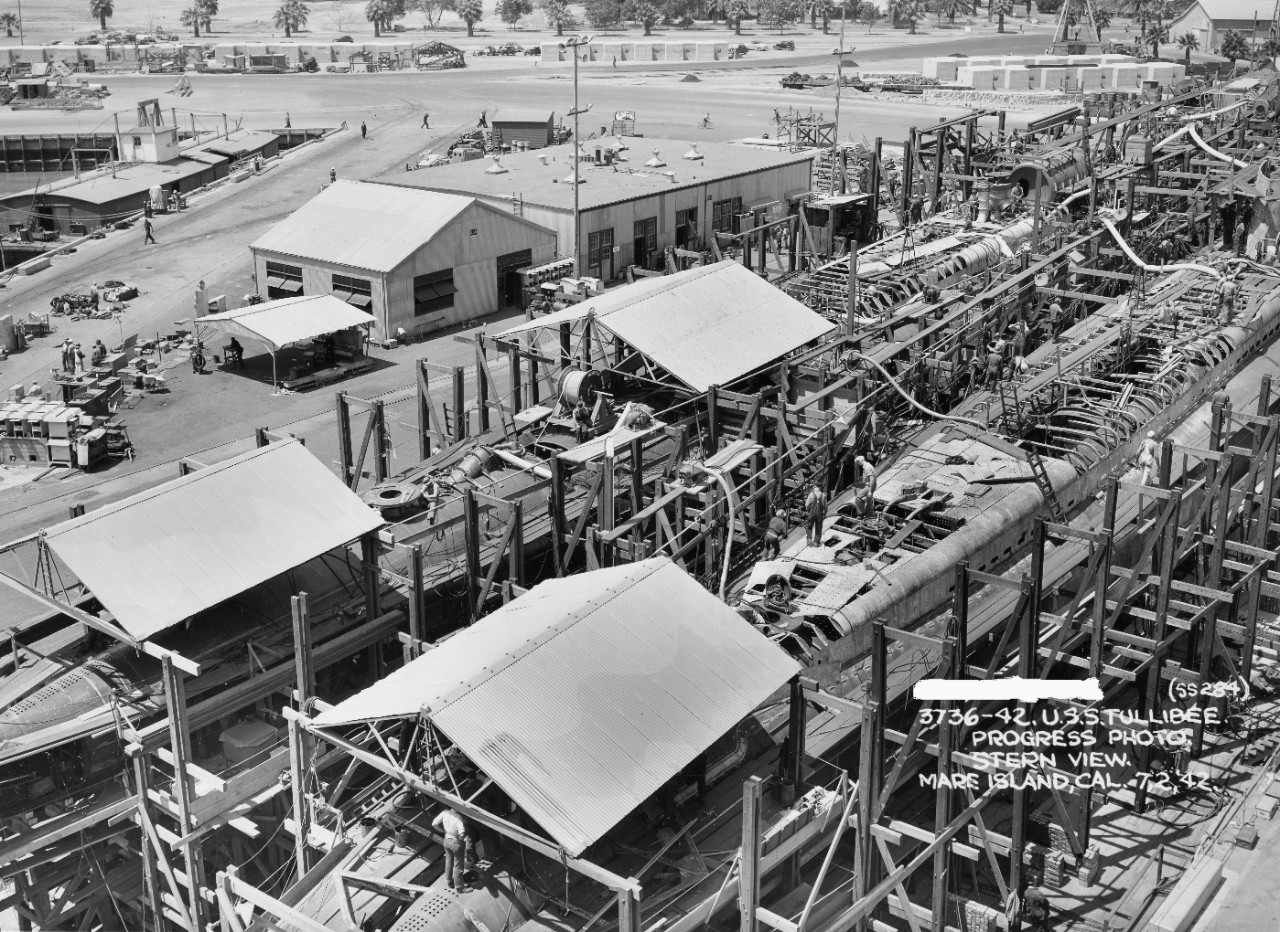 Tullibee and a sister under construction at Mare Island, 1 July 1942. (U.S. Navy Bureau of Ships Photograph, 19-LCM Box 540, National Archives and Records Administration, Still Pictures Division, College Park, Md.)