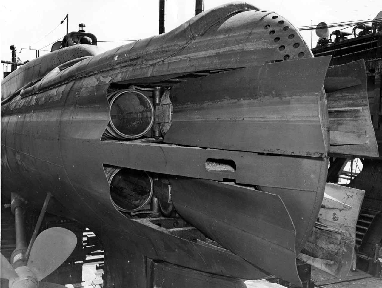 Tullibee’s port after torpedo tube shutters in the open position, Pearl Harbor Navy Yard, 24 May 1943. (U.S. Navy Bureau of Ships Photograph, 19-LCM Box 540, National Archives and Records Administration, Still Pictures Division, College Park, Md.)