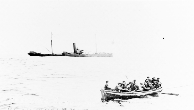 HMS Zylpha sinking on 11 June 1917, photographed from Warrington which is rescuing the survivors in the boat. Courtesy of Mr. Gustavus C. Robbins, Somerville, Mass., 1973. (Naval History and Heritage Command Photograph NH 77169)