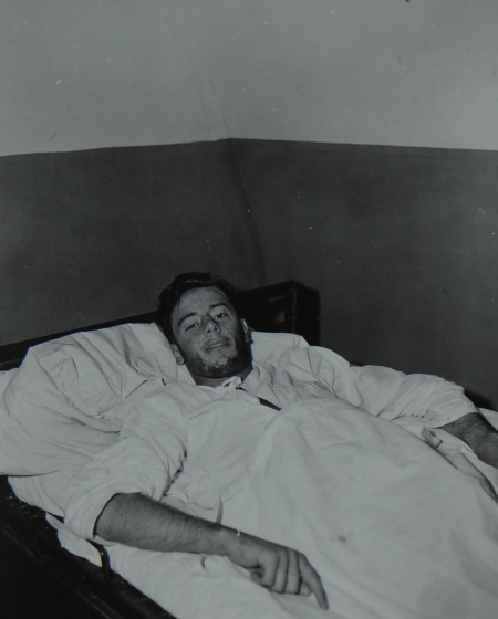 Ens. John Woolston USNR, survivor of the USS Indianapolis in Naval Base Hospital No. 20, Peleliu, 5 August 1945.