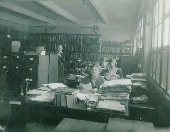Old Records, Office of Naval Records & Library. Miss N.D. Barney in charge, Miss E. Cravan, Mrs. A. Lawrence and Mrs. Alice Thomas, 1930. Photo by Childs, C&R. Naval Historical Center, Photographic Section, #NH000423.