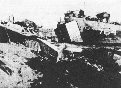 LST's and LSM's Are Force To Land Close Together Due to Wreckage and Lack of Exits Over Steep Terrace.