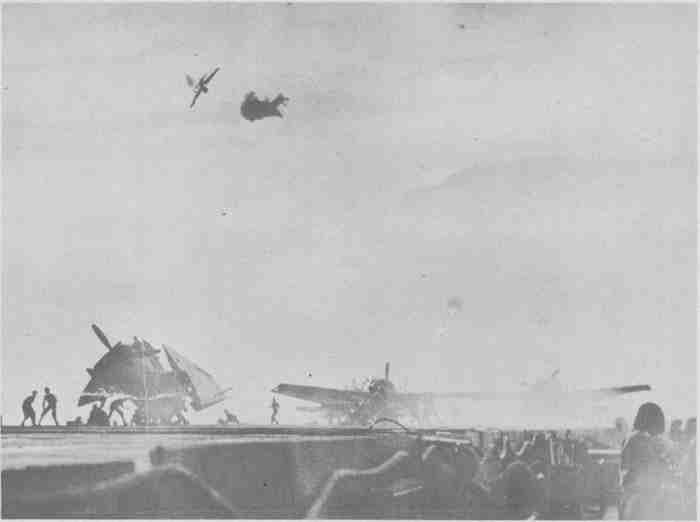 Jap suicide plane hit while diving on USS Natoma Bay (CVE-62)