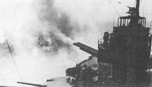 The Pennsylvania bombards Attu during landing operations of 11 May 1943.