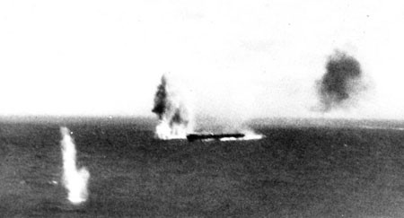 A near hit off the starboard bow of a Zuikaku class carrier.