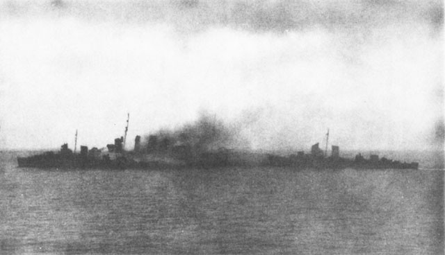 Destroyers removing personnel from the Canberra. 