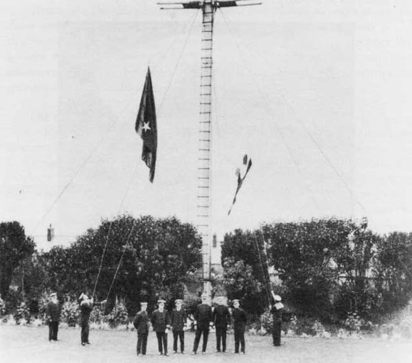 Admiral William S. Sims, USN, hoists his flag at Queenstown, June 1917. 