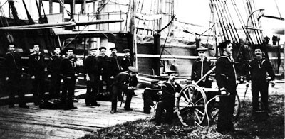Image of USS Enterprise landing party with 3-inch field gun, circa 1887-1890.