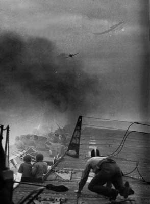 On the inside front cover: Photo during the Battle of Leyte Gulf on 25 October 1944