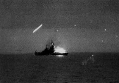 Maryland (BB 46) being hit by a kamikaze on the evening of 29 November 1944.