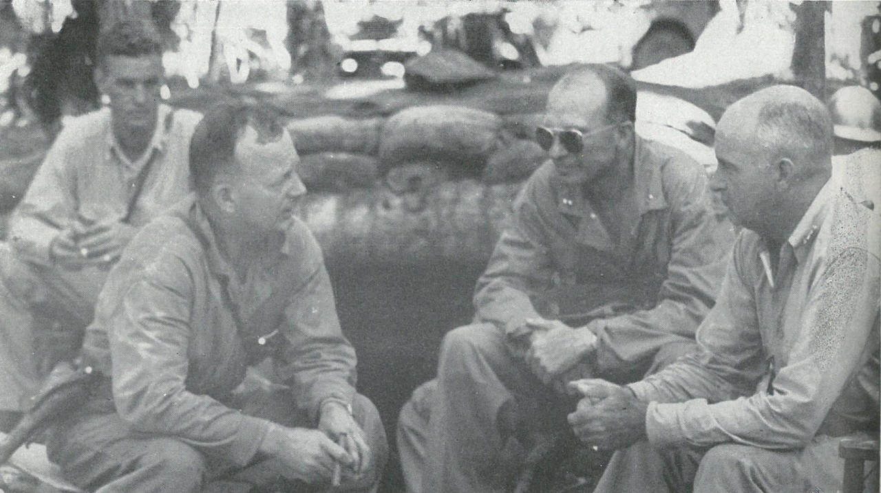 MAJGEN PATCH, USA, receives first-hand briefing from Gen Vandegrift and Col R.H. Jeschke. On 9 December 1942 the task of completing the campaign passed to Gen Patch when the 1st Marine Division was withdrawn from Guadalcanal.
