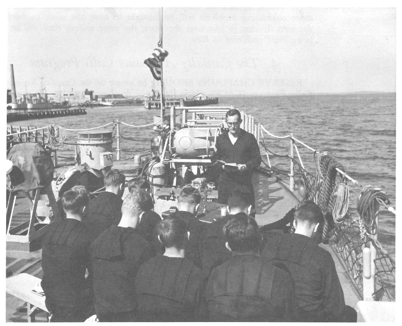 Rear view of seamen aboard moving ship