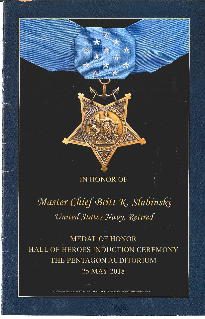 Jpeg version of the cover page of the  commemorative program that was presented to the audience at the Hall of Heroes Induction Ceremony upon the awarding of the Medal of Honor to Master Chief Britt K Slabinski on 25 May 2018 at the Pentagon Audi...