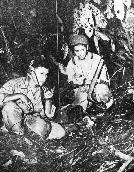 Image: Cpl. Henry Bake, Jr., and Pfc. George H. Kirk, Navajo code talkers, operate a portable radio set on Bougainville. Official U.S. Marine Corps Photo. See page 25. 