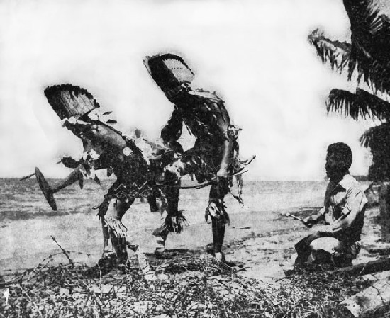 Image: Navajos dance on a beach in the Solomons. Photo U.S. Army Signal Corps.