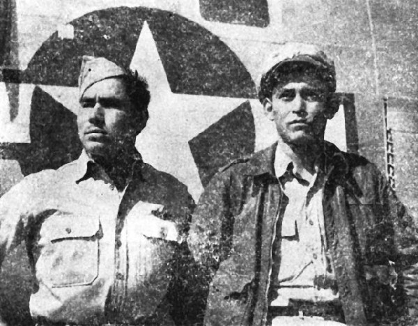 Image: T-Sgt. Oliver Gibb, (left), Red Lake, Minnesota, wears the Air Medal. The officer on the right is an Indian from Oklahoma. 