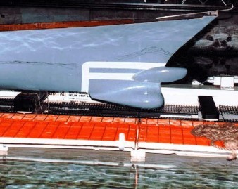Figure 2. Bulbous Bow Design for DDG-51 - (bulb above, existing sonar dome below)