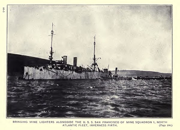 Bringing mine lighters alongside the USS San Francisco, of Mine Squadron 1, North Atlantic Fleet, Inverness Firth.