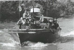 US Navy Mark I River Patrol Boat (PBR) on a Mekong Delta waterway.