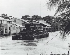 US Navy Command Communications Boat of Task Group 117.2 prepares to dock at Vietnamese junk base at Rach Soi in the Mekong Delta. 