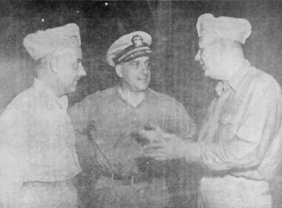 Vice Admiral BARBEY with Rear Admiral ARTHUR D. STRUBLE, U. S. Navy (left), Commander Amphibious Group Nine and Rear Admiral WILLIAM M. FECHTELER, U. S. Navy (right), Commander Amphibious Group Eight.
